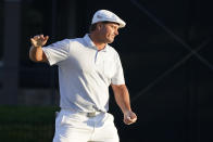 Bryson DeChambeau reacts after missing a putt on the 16th green during the final round of the Arnold Palmer Invitational golf tournament Sunday, March 7, 2021, in Orlando, Fla. (AP Photo/John Raoux)