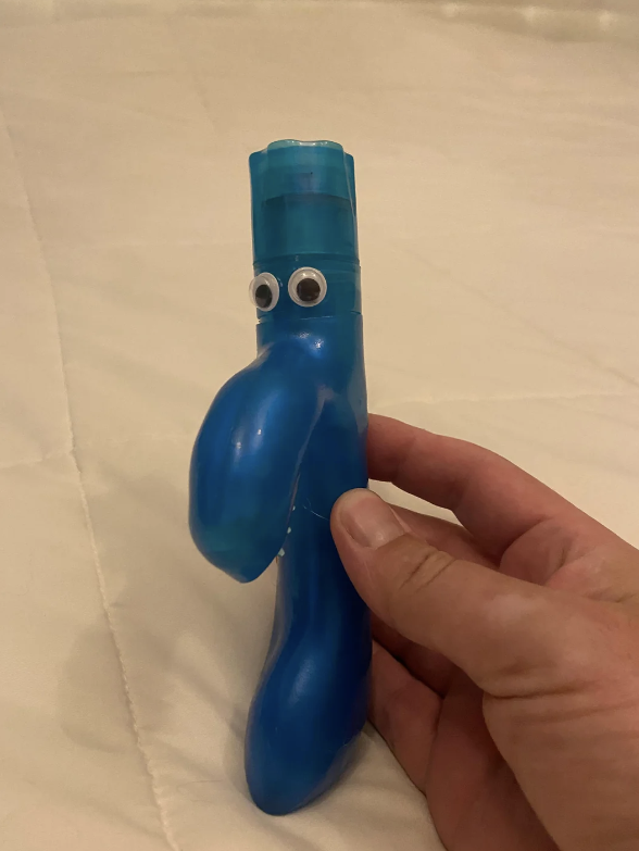 eyes glued on a dildo