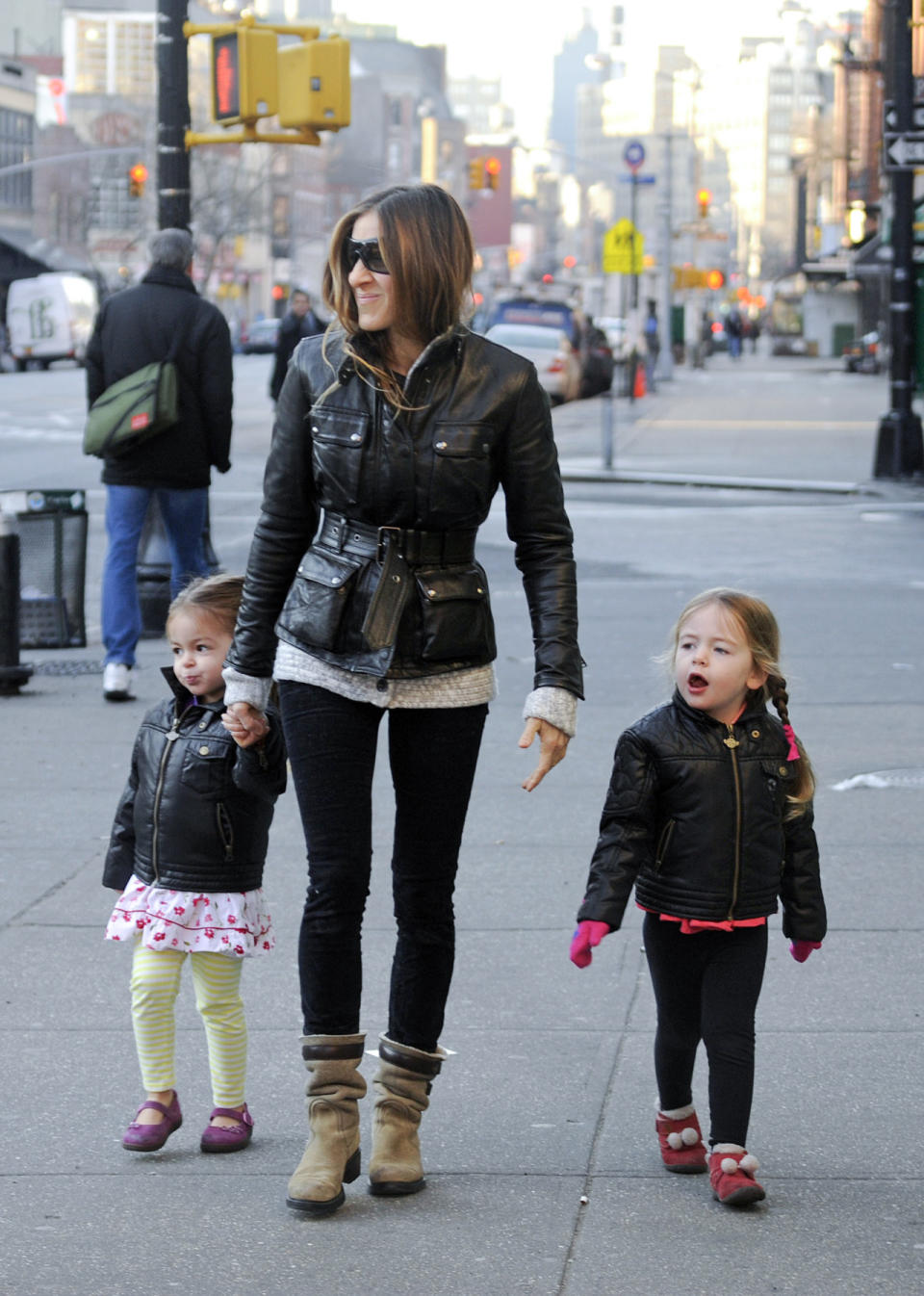 Sarah Jessica Parker with Marion Broderick and Tabitha Broderick in black jackets.