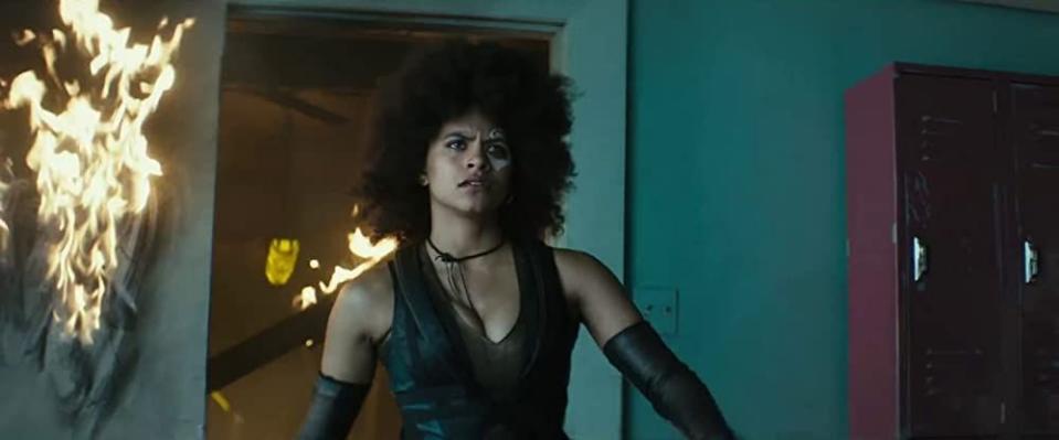 zazie beetz as domino in deadpool 2, pausing during battle