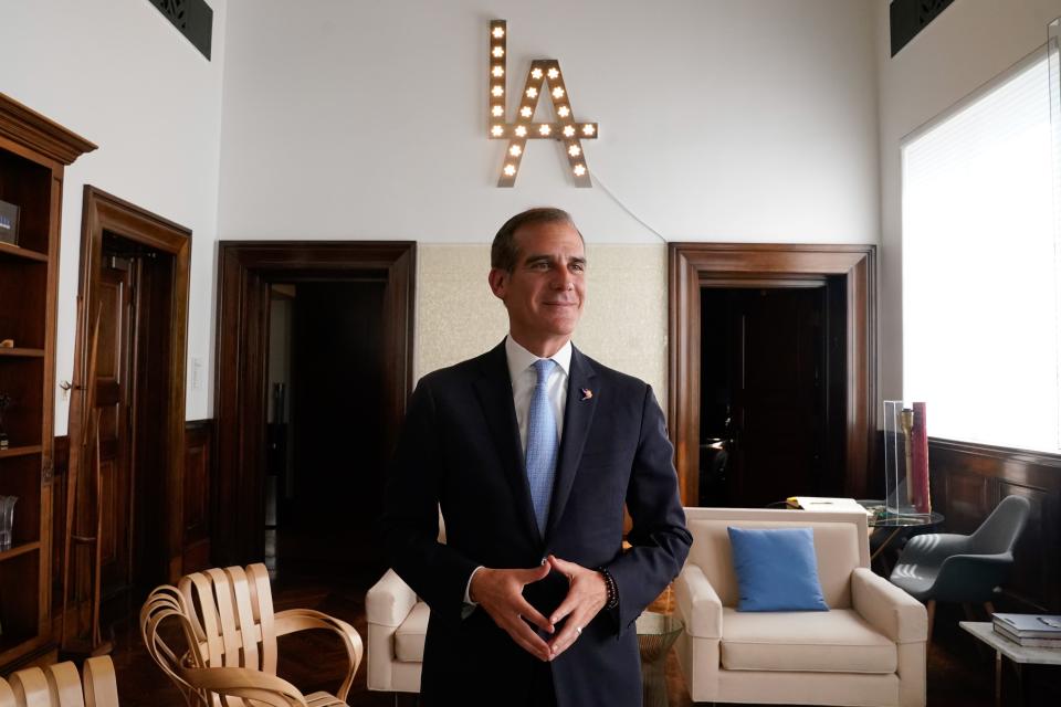 Former Los Angeles Mayor Eric Garcetti poses for a portrait at City Hall on March 30, 2022.