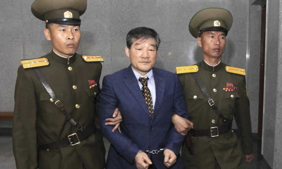 Kim Dong Chul, center, a US citizen detained in North Korea.