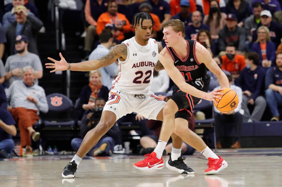 Jan 19, 2022; Auburn, Alabama, USA;  Auburn Tigers guard Allen Flanigan (22) pressures Georgia Bulldogs forward Jaxon Etter (11) during the second at Auburn Arena. Mandatory Credit: John Reed-USA TODAY Sports