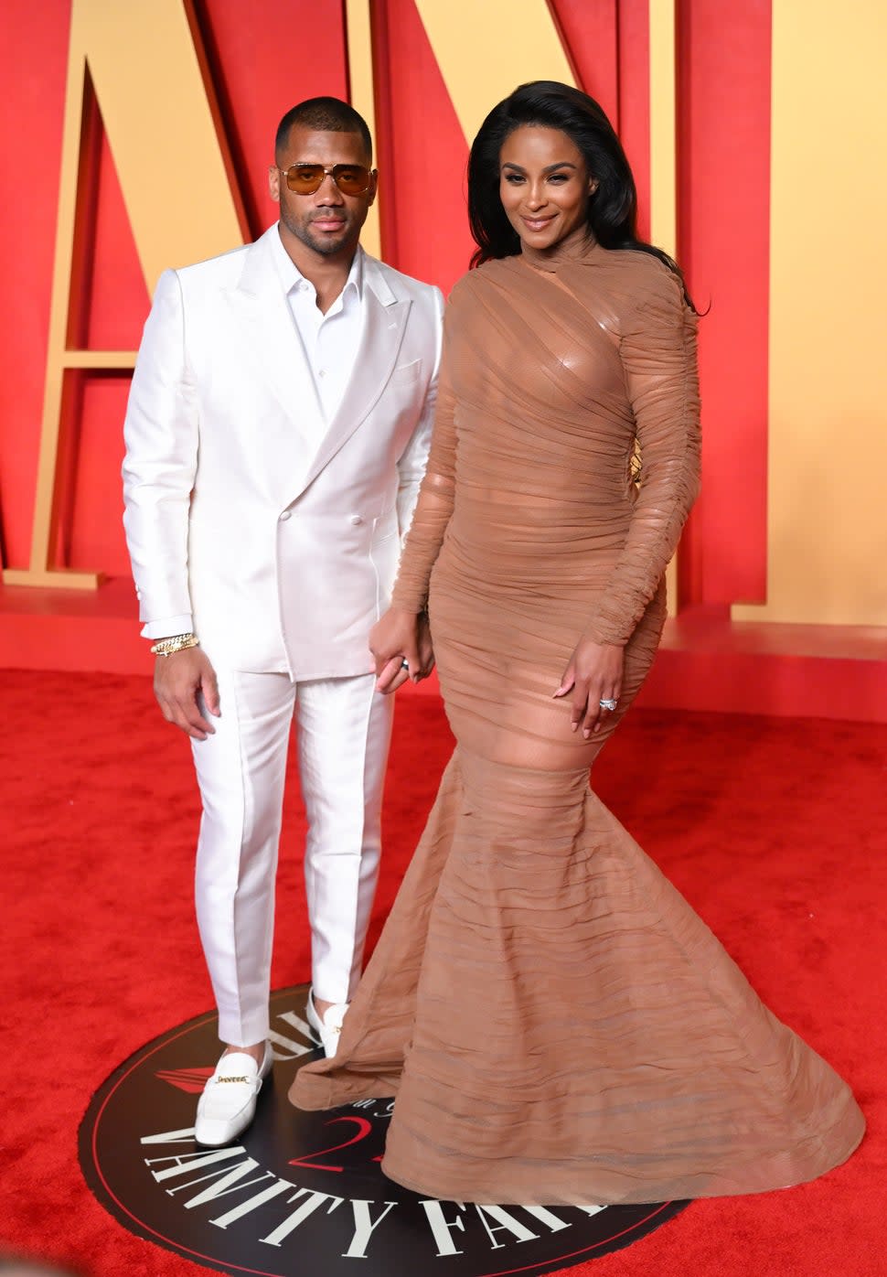 Russell Wilson and Ciara attends the 2024 Vanity Fair Oscar Party hosted by Radhika Jones at the Wallis Annenberg Center for the Performing Arts on March 10, 2024 in Beverly Hills, California.