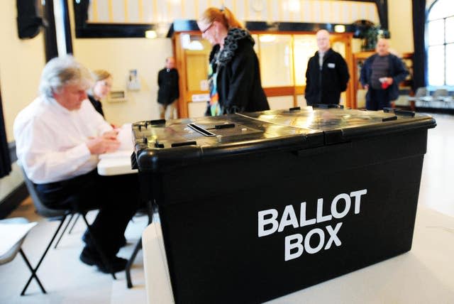 Voting at the polling station at Market Hall in Swadlincote, Derbyshire, as the General Election got underway across the UK