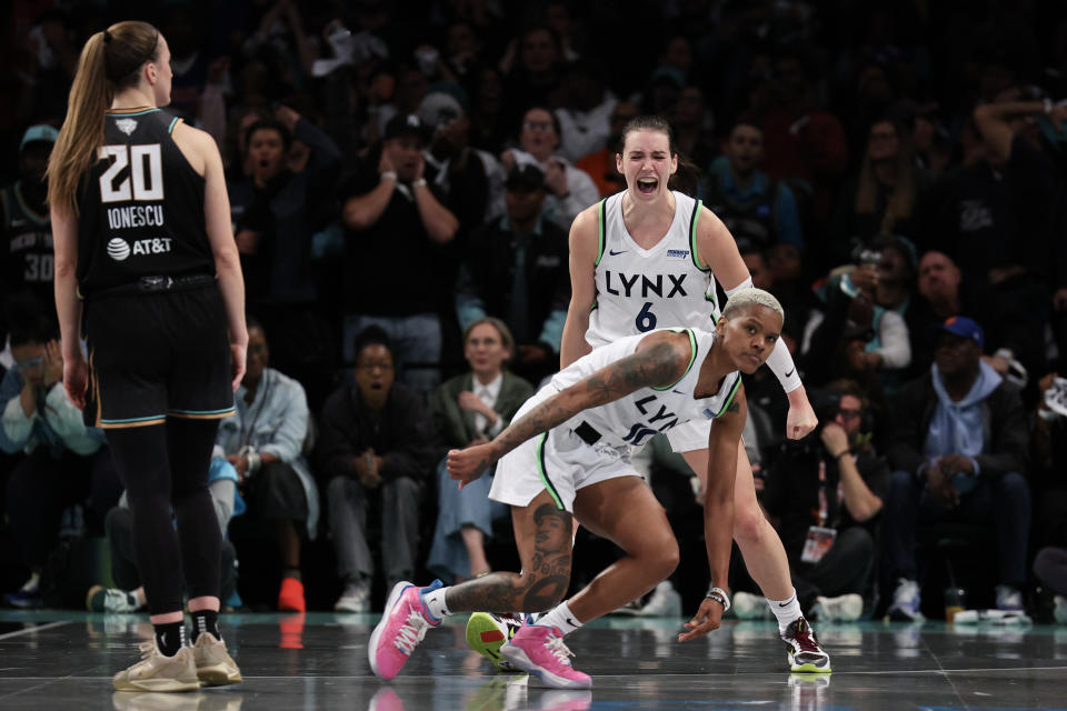 NEW YORK, NEW YORK - OCTOBER 10: Courtney Williams #10 and Bridget Carleton #6 of the Minnesota Lynx react after being fouled during the second half against the New York Liberty during Game One of the WNBA Finals at the Barclays Center on October 10, 2024 in New York City. (Photo by Elsa/Getty Images)