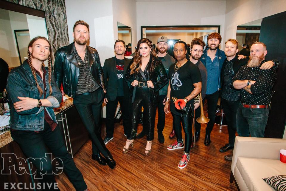 Lady A and their band pose together before the final run of the residency.