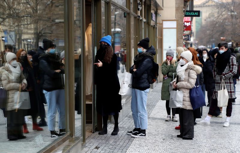 Customers at re-opened shops as restrictions ease in Prague