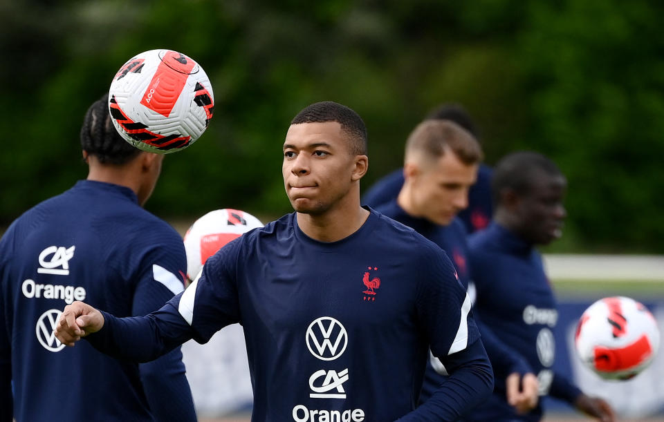 France's forward Kylian Mbappe eyes the ball during a training session in Clairefontaine-en-Yvelines, outside Paris, on May 29, 2022 as part of the team's preparation for the upcoming UEFA Nations League. (Photo by FRANCK FIFE / AFP) (Photo by FRANCK FIFE/AFP via Getty Images)