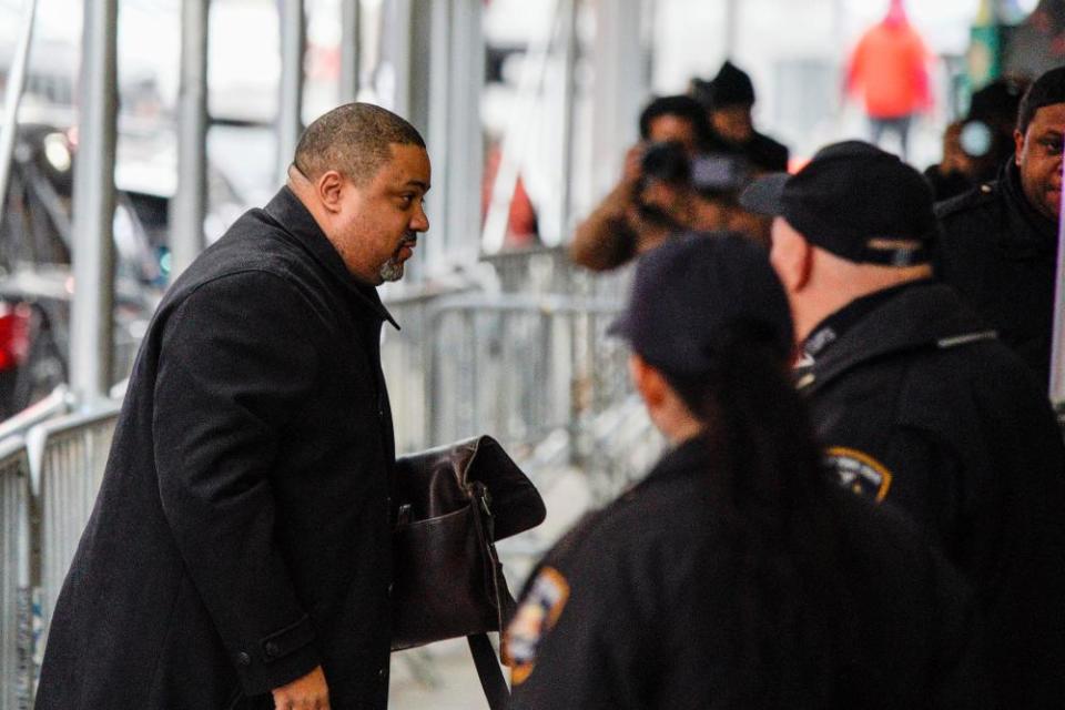 Manhattan district attorney Alvin Bragg arrives at his office on 24 March.