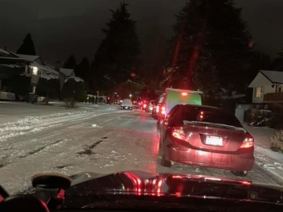 Carson Hopkins photographed the lineup of cars in a residential neighborhood in Richmond where he was stopped for hours.  (Submitted by Carson Hopkins - image credit)