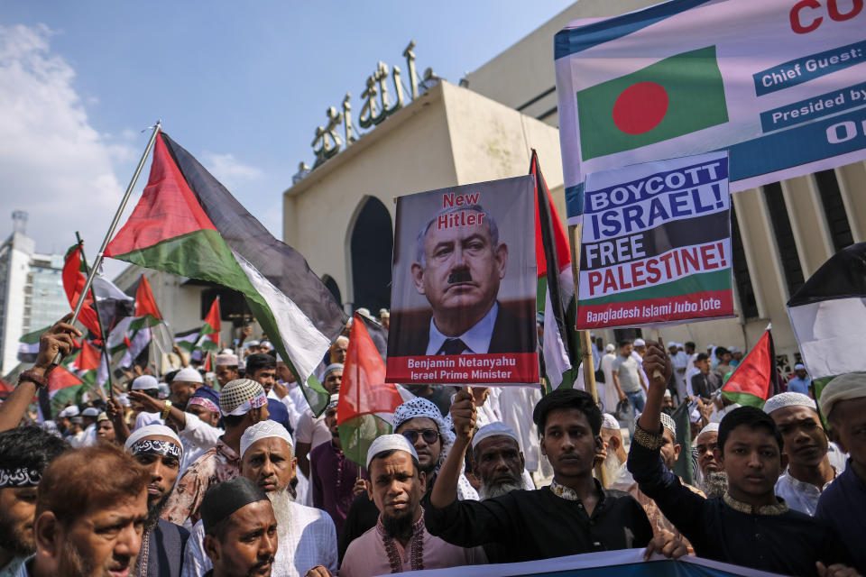 Muslims protest against Israel's military operations in Gaza and to support the Palestinian people, in front of Baitul Mukarram mosque in Dhaka, Bangladesh, Friday, Oct. 13, 2023. (AP Photo/Mahmud Hossain Opu)