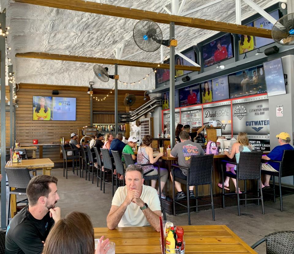 Time Out Sports Bar Plus sustained storm damage to it's outdoor dining area in 2022. Now the spacious patio has been refreshed and reopened.