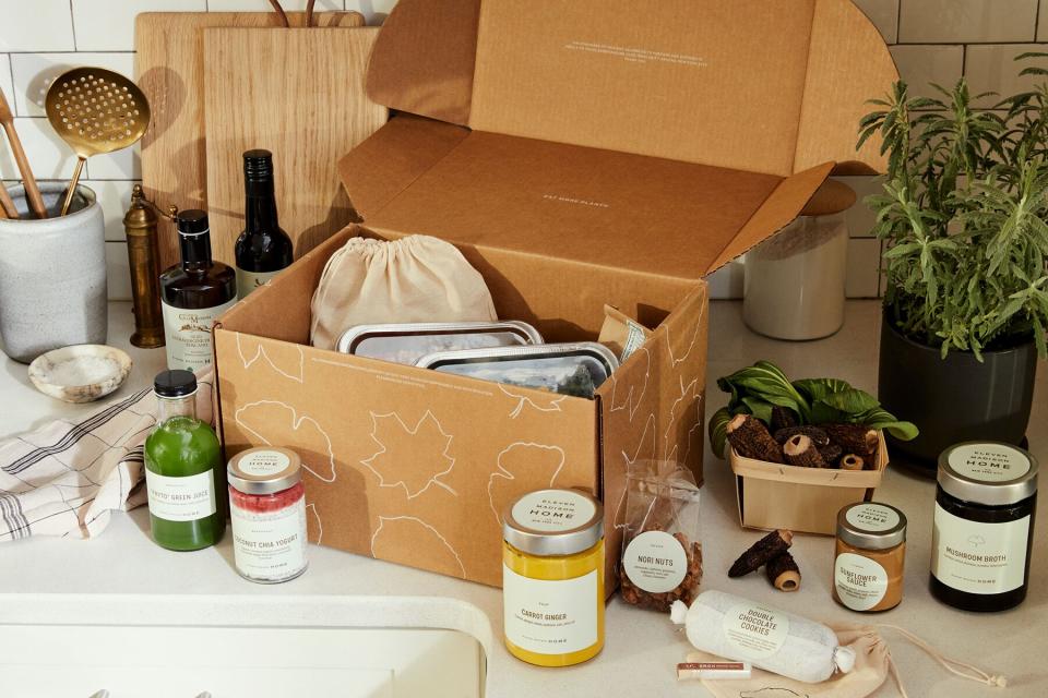 Ingredients from the Eleven Madison Home delivery box on a kitchen counter