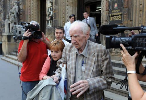 Laszlo Csatary leaves the Budapest court building. Hungarian authorities detained, grilled and put under house arrest on Wednesday the 97-year-old who tops the Simon Wiesenthal Center's dwindling wanted-list of suspected Nazi war criminals