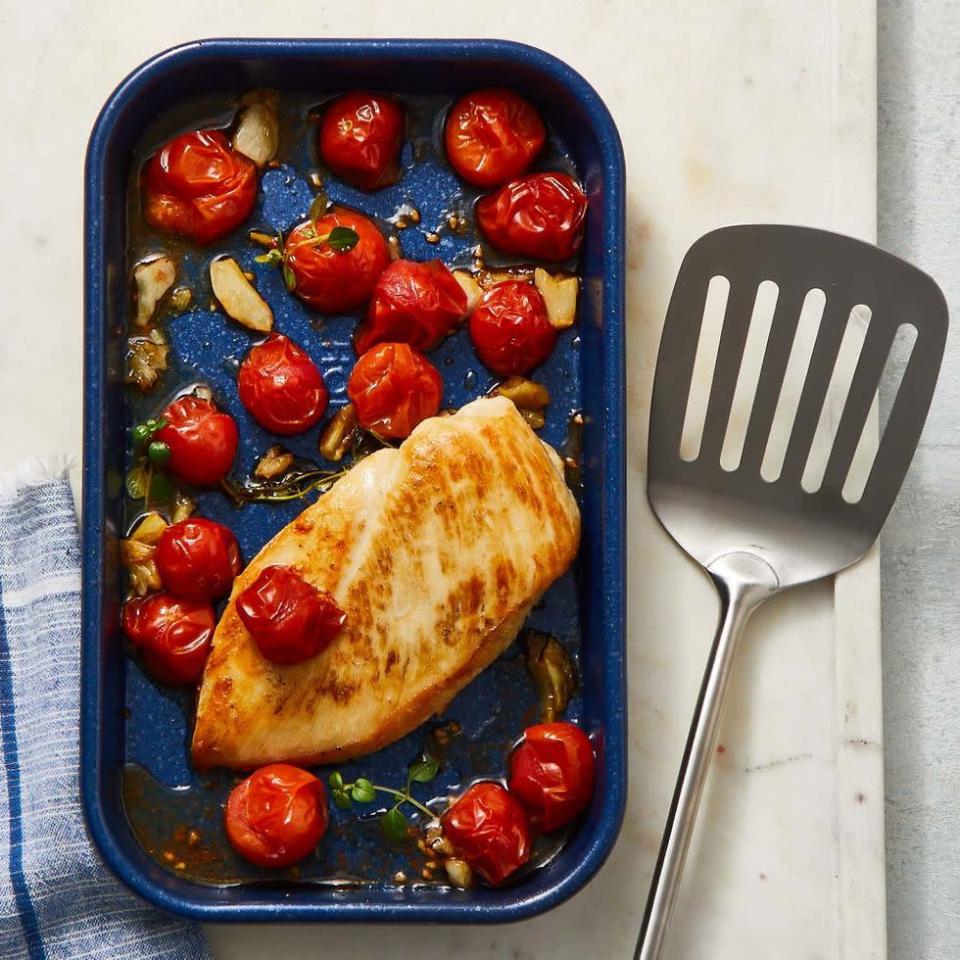 <p>It sounds simple — and that's because it is. You only need five ingredients (plus salt and pepper) to make this tasty chicken for one.</p><p>Get the <strong><a href="https://www.goodhousekeeping.com/food-recipes/a38514231/roasted-chicken-and-tomatoes-recipe/" rel="nofollow noopener" target="_blank" data-ylk="slk:Roasted Chicken and Tomatoes recipe" class="link ">Roasted Chicken and Tomatoes recipe</a></strong><em>.</em></p>