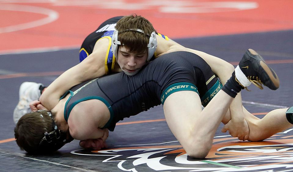 Ontario's Jacob Ohl wrestles Akron St. Vincent St. Mary's Christian Osborne during their match Friday, March 11, 2022 at the OHSAA State Wrestling Championship at the Jerome Schottenstein Center in Columbus. TOM E. PUSKAR/TIMES-GAZETTE.COM