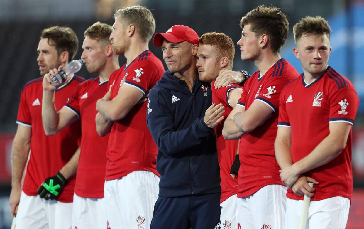 Great Britain Head Coach, Danny Kerry embraces Jack Waller of Great Britain during the penalty shootout in the Men's FIH Field Hockey Pro League match between Great Britain and Netherlands at Lee Valley Hockey and Tennis Centre on June 14, 2019 in London, United Kingdom