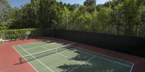 <p>The home's private, lit tennis court.</p>