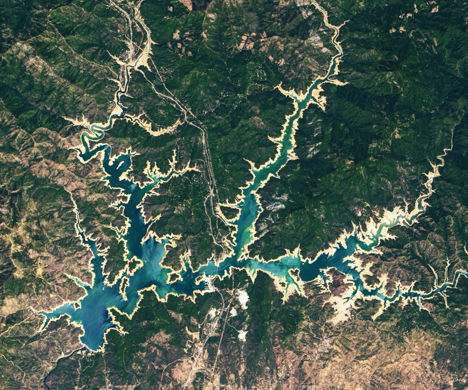 Shasta Lake in California, pictured in 2021 with a depleted water level. (NASA)