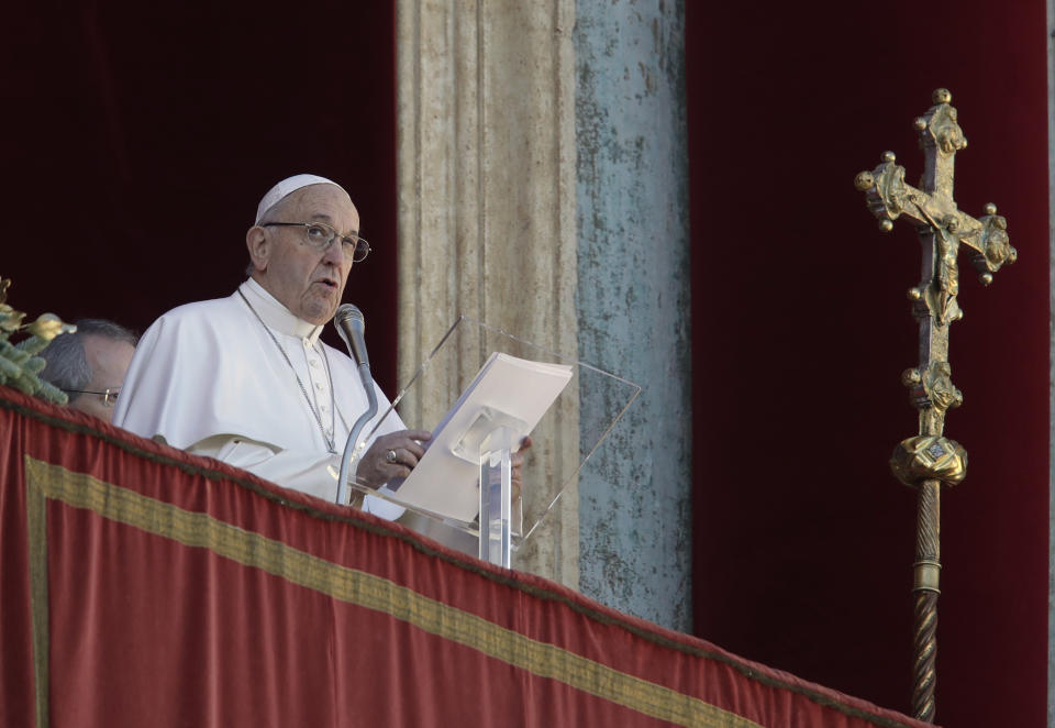 Pope Francis delivers his message during the Urbi et Orbi (Latin for 'to the city and to the world' ) Christmas' day blessing from the main balcony of St. Peter's Basilica at the Vatican, Tuesday, Dec. 25, 2018. (AP Photo/Alessandra Tarantino)