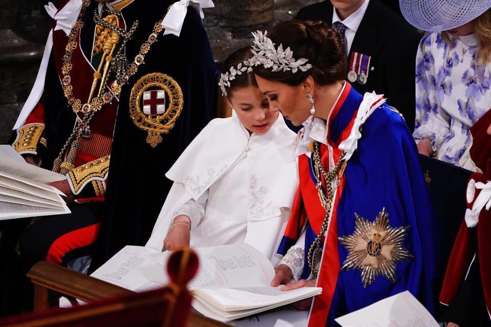 <p>LONDON, ENGLAND - MAY 06: Princess Charlotte and the Catherine, Princess of Wales during the Coronation of King Charles III and Queen Camilla on May 6, 2023 in London, England. The Coronation of Charles III and his wife, Camilla, as King and Queen of the United Kingdom of Great Britain and Northern Ireland, and the other Commonwealth realms takes place at Westminster Abbey today. Charles acceded to the throne on 8 September 2022, upon the death of his mother, Elizabeth II. (Photo by Yui Mok - WPA Pool/Getty Images)</p> 