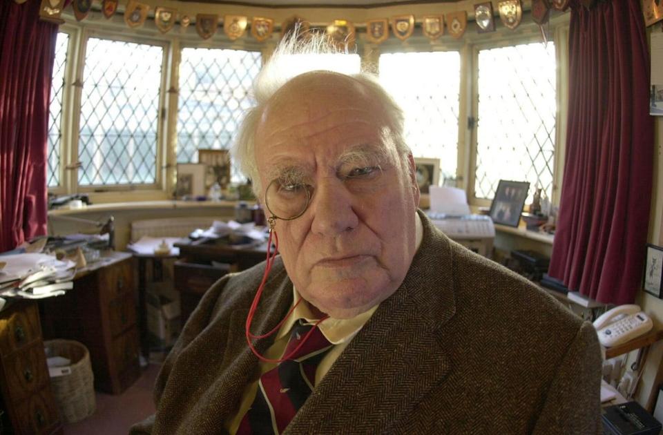 Astronomer Patrick Moore, who died in 2012, at home in Selsey (PA)