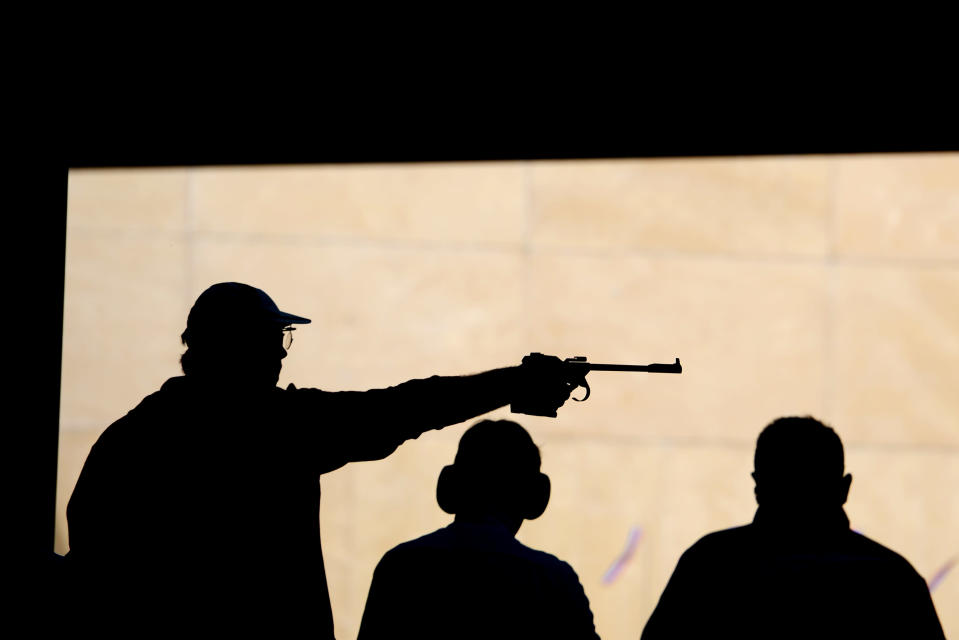 LONDON, ENGLAND - AUGUST 05: Shooters compete in the Men's 50m Pistol Shooting on Day 9 of the London 2012 Olympic Game at the Royal Artillery Barracks on August 5, 2012 in London, England. (Photo by Lars Baron/Getty Images)