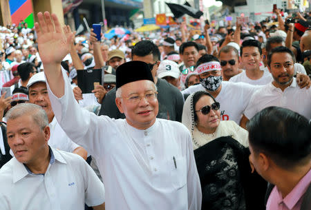 Former Malaysian Prime Minister Najib Razak and his wife Rosmah Mansor attend the Anti-ICERD (International Convention on the Elimination of All Forms of Racial Discrimination) mass rally in Kuala Lumpur, Malaysia, December 8, 2018. REUTERS/Sadiq Asyraf