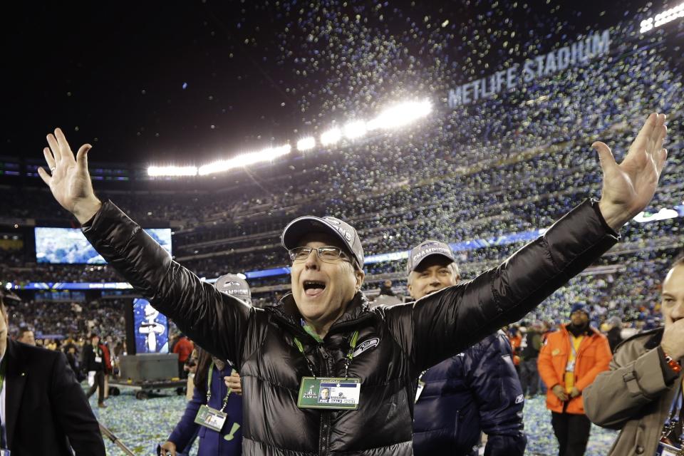 FILE - In this Feb. 2, 2014 file photo, Seattle Seahawks owner Paul Allen celebrates after the NFL Super Bowl XLVIII football game against the Denver Broncos in East Rutherford, N.J. The Seahawks won 43-8. Allen, billionaire owner of the Trail Blazers and the Seattle Seahawks and Microsoft co-founder, died Monday, Oct. 15, 2018 at age 65. Earlier this month Allen said the cancer he was treated for in 2009, non-Hodgkin’s lymphoma, had returned. (AP Photo/Mark Humphrey, File)
