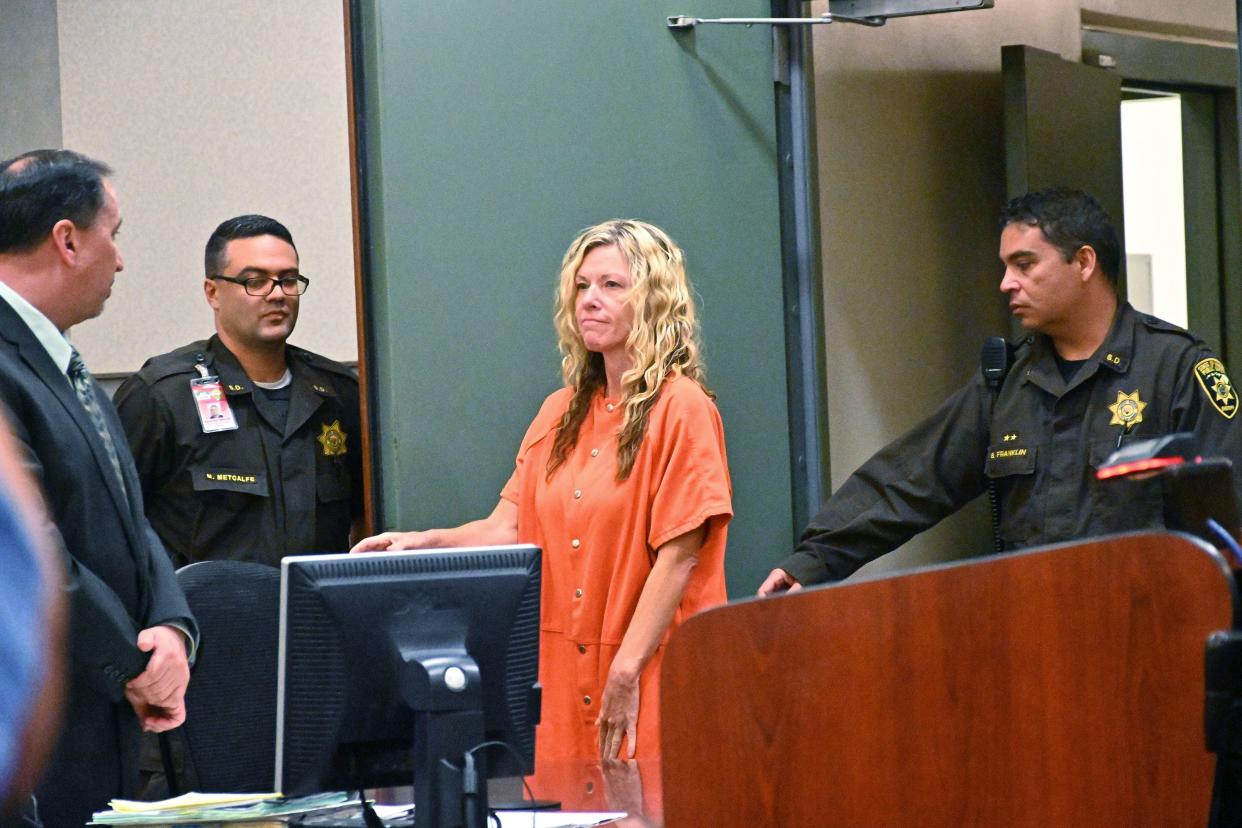 Lori Vallow appears in court in Lihue, Hawaii on Wednesday, Feb. 26, 2020. A judge ruled that bail will remain at $5 million for Vallow, also known as Lori Daybell, who was arrested in Hawaii over the disappearance of her two Idaho children. Vallow requested a hearing so the judge would consider a reduced bail. After the judge denied the request, her defense attorney, Craig De Costa, left, said she is waiving an extradition hearing, which had been scheduled for March 2. Kauai Prosecutor Justin Kollar said he will work with Idaho authorities on logistics for her departure.