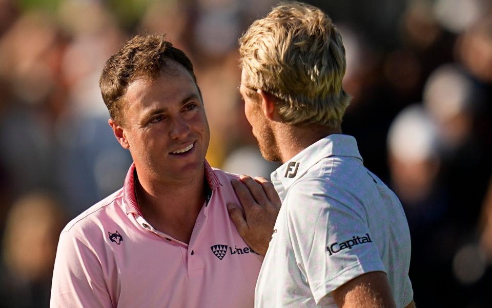 Justin Thomas, left, is greeted by Will Zalatoris after winning the PGA Championship golf tournament - AP