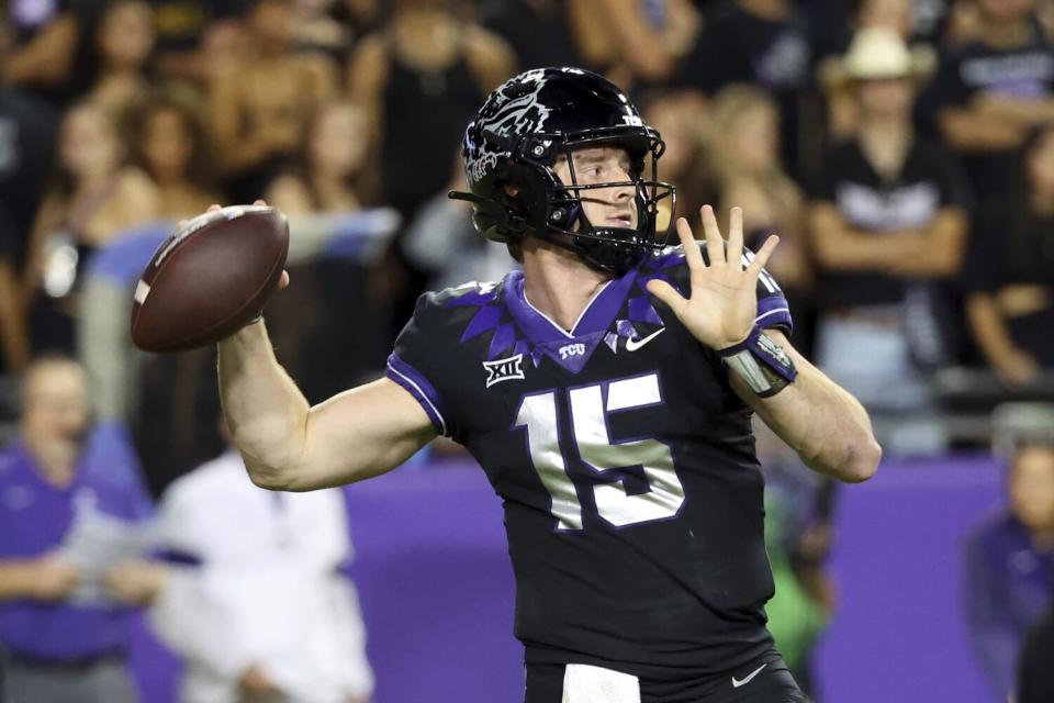 TCU's Max Duggan throws a pass.