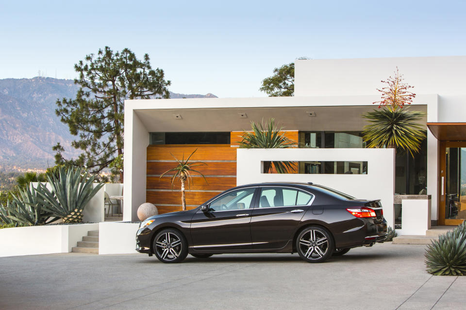 This photo provided by Honda shows the 2016 Honda Accord sedan, which is well-known for its sporty handling and long list of standard features, including a rearview camera. (Courtesy of American Honda Motor Co. via AP)