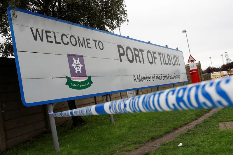 Police tape is seen at the entrance to the Port of Tilbury where the bodies of immigrants are being held by authorities, following their discovery in a lorry in Essex on Wednesday morning, in Tilbury