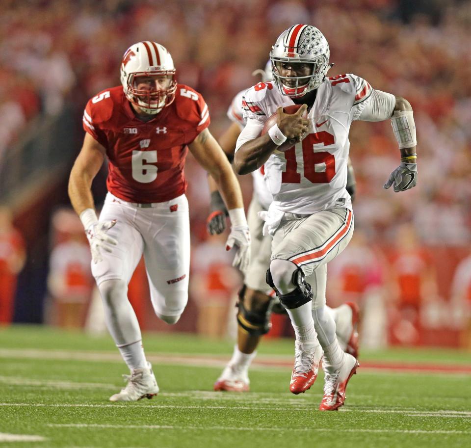 Ohio State's J.T. Barrett passed for 226 passing yards and one touchdown and ran for 92 yards and two touchdowns against Wisconsin in 2016.