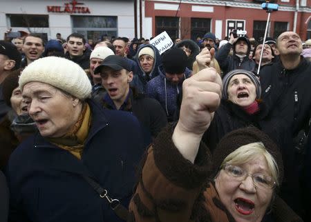 People shout slogans during a protest against increased tariffs for communal services and new taxes, including the tax for those who are not in full-time employment, in the town of Bobruisk, Belarus March 12, 2017. REUTERS/Vasily Fedosenko