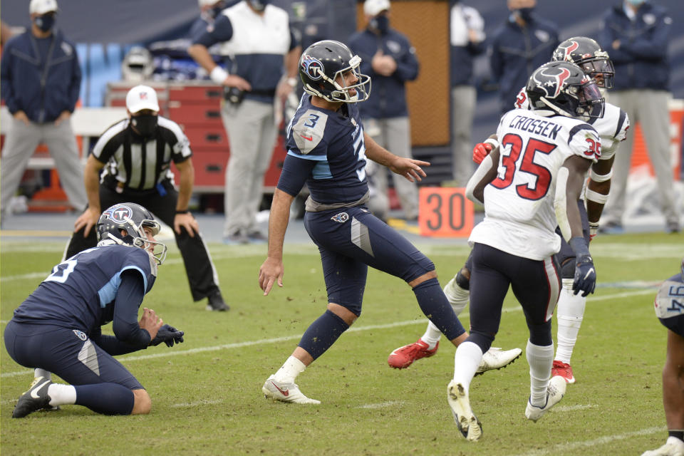 Tennessee Titans kicker Stephen Gostkowski (3) watches his kick for an extra point to tie the game against the Houston Texans in the final seconds of the fourth quarter during an NFL football game Sunday, Oct. 18, 2020, in Nashville, Tenn. The Titans won in overtime 42-36. (AP Photo/Mark Zaleski)