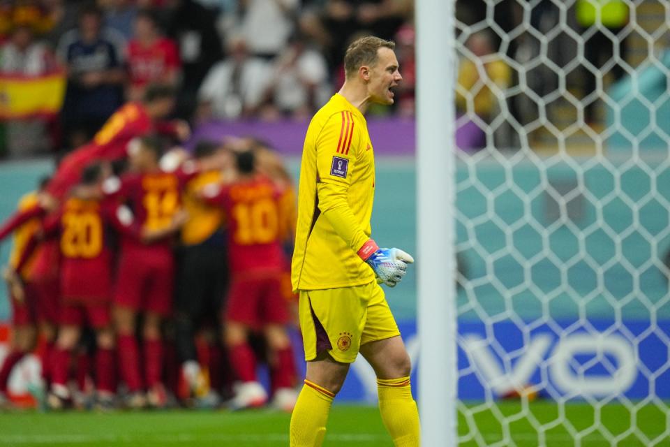 Germany's goalkeeper Manuel Neuer reacts after Spain's Alvaro Morata scored his side's opening goal during the World Cup group E football match between Spain and Germany, at the Al Bayt Stadium in Al Khor , Qatar, Sunday, Nov. 27, 2022. (AP Photo/Julio Cortez)