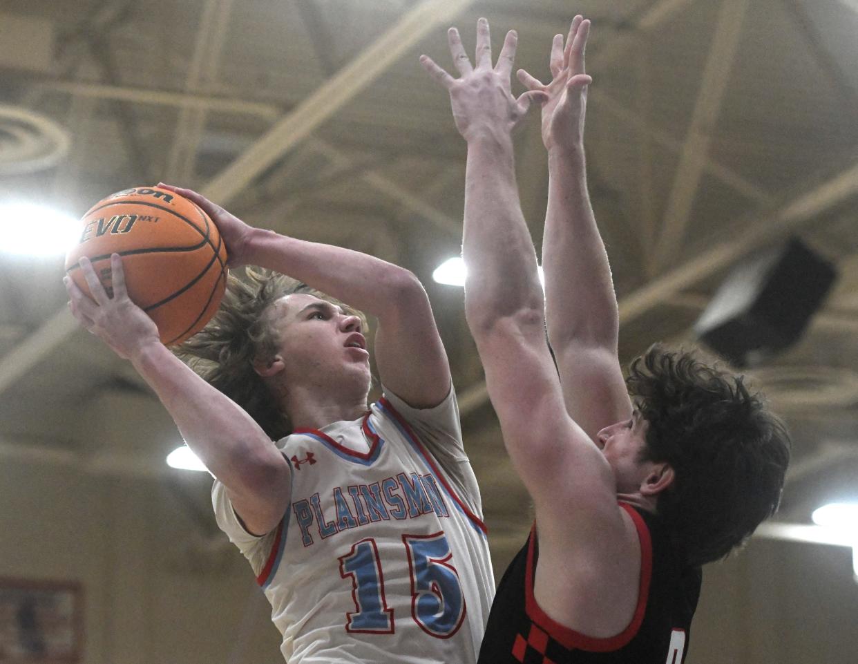 Monterey's Carter Bovkoon goes for a layup against Lubbock-Cooper in a District 4-5A basketball game, Tuesday, Feb. 13, 2024, at the New Box.