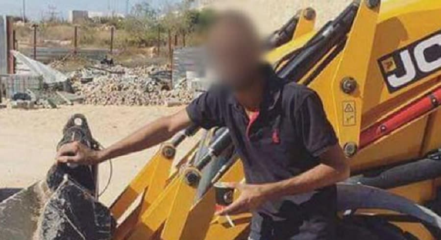 The man posted a photo of himself on a construction site in the West Bank: Facebook