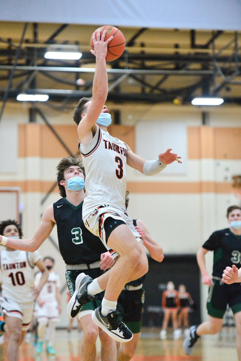 Taunton's Trent Santos takes a shot during Tuesday night's game against Mansfield.