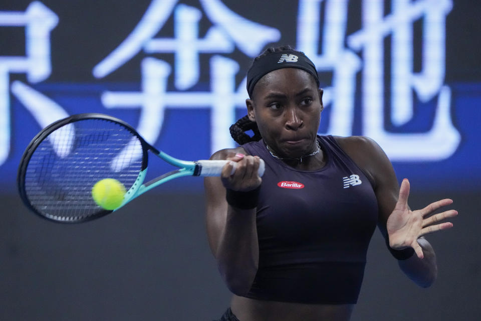 Coco Gauff of the United States hits a return shot against Ekaterina Alexandrova of Russia during the first round of the women's singles match in the China Open tennis tournament at the Lotus Court in Beijing, Monday, Oct. 2, 2023. (AP Photo/Andy Wong)