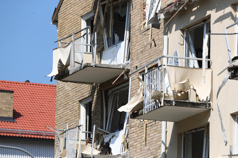 A view of damaged balconies and windows at a block of flats that were hit by an explosion, in Linkoping, Sweden, Friday, June 7, 2019. A blast ripped through two adjacent apartment buildings in a southern Sweden city on Friday, police said. There were unconfirmed reports of people with minor injuries. (Jeppe Gustafsson/TT News Agency via AP)