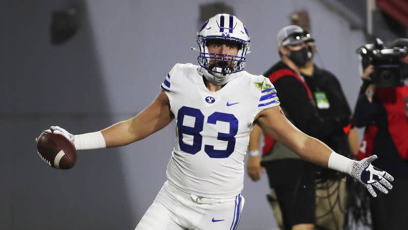 Brigham Young Cougars tight end Isaac Rex (83) scores against the UCF Knights during the Boca Raton Bowl in Boca Raton, Fla., on Tuesday, Dec. 22, 2020.