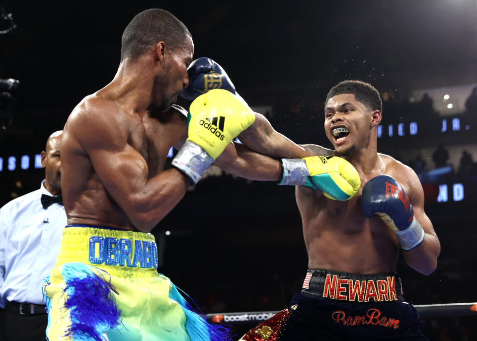 NEWARK, NEW JERSEY - SEPTEMBER 23: Robson Conceição (L) and Shakur Stevenson (R) trade punches during their WBC and WBO junior lightweight championship bout at the Prudential Center on September 23, 2023 in Newark, New Jersey.  (Photo by Mikey Williams/Top Rank Inc via Getty Images)