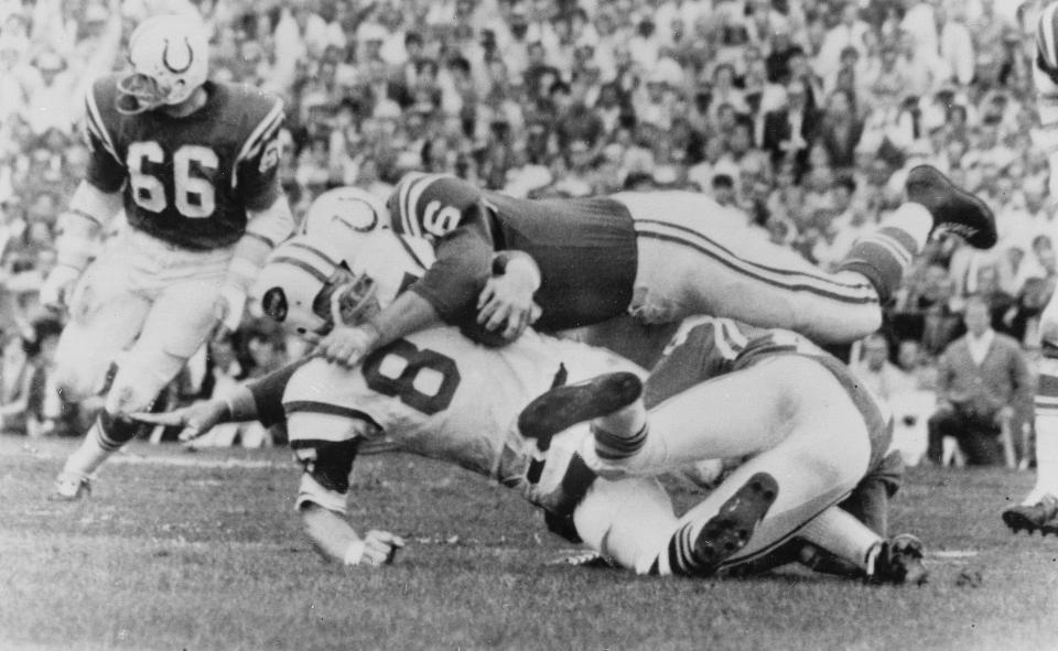 File-This Jan. 12, 1969 file photo shows New York Jets Pete Lammons (87) getting tackled during the Super Bowl in Miami, Fla. Lammons, a tight end on the New York Jets' Super Bowl-winning team in 1969, has died in a boating accident. He was 77. Major League Fishing announced in a statement Friday, April 30, 2021, that Lammons was participating in a fishing event on the Sam Rayburn Reservoir in Texas on Thursday morning when he slipped while boarding a boat, fell into the water, and drowned. (AP Photo/File)