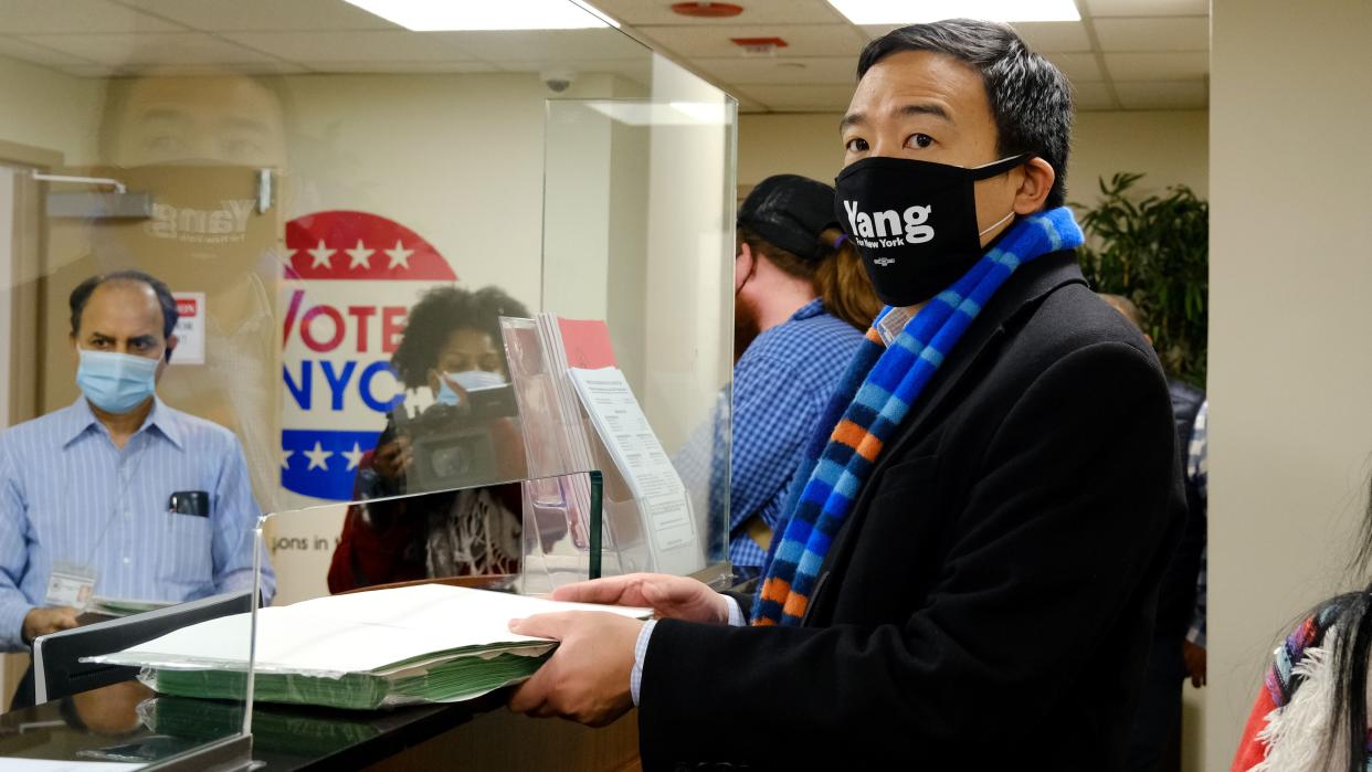 Mayoral candidate Andrew Yang delivers his signature books at the Board of Elections in downtown Manhattan on Tuesday morning. 