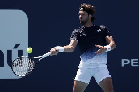 FILE PHOTO: Mar 26, 2019; Miami Gardens, FL, USA; Nikoloz Basilashvili of Georgia hits a forehand against Felix Auger-Aliassime of Canada (not pictured) in the fourth round of the Miami Open at Miami Open Tennis Complex. Mandatory Credit: Geoff Burke-USA TODAY Sports