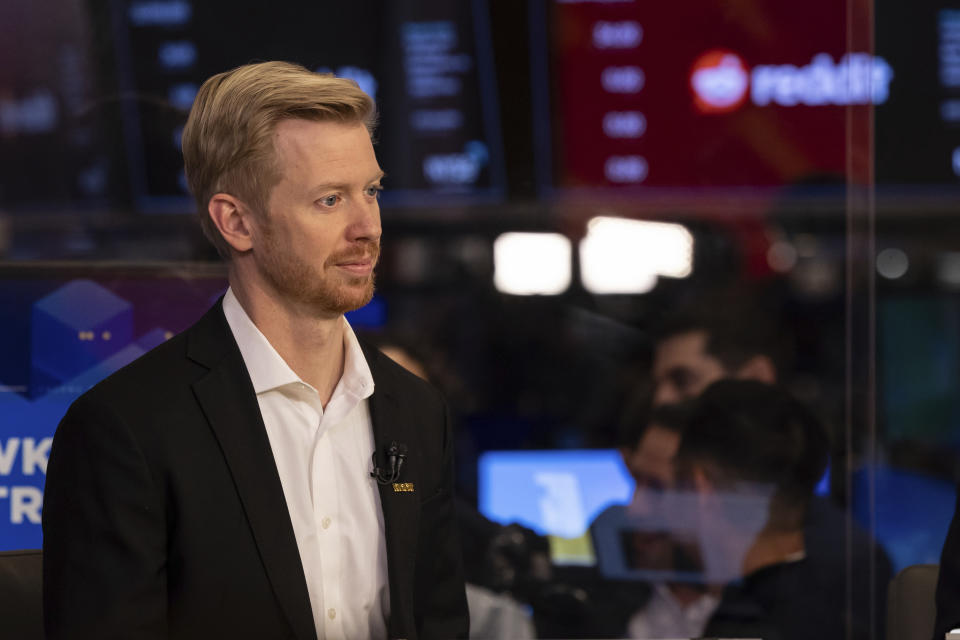 Reddit CEO Steve Huffman is seen on the New York Stock Exchange trading floor, prior to his company's IPO, Thursday, March. 21, 2024. (AP Photo/Yuki Iwamura)